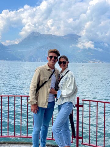 Couple in front of mountain in Varenna.